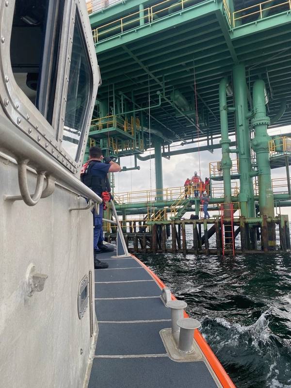 UNITED STATE Coast Guard Saves Three Boaters Stranded on Offshore Oil Platform